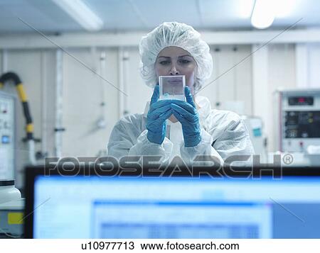 Scientist with fusion target View Large Photo Image Stock Image - Scientist with fusion target. Fotosearch