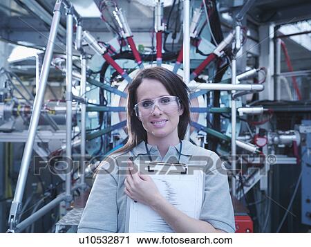 Scientist with particle accelerator View Large Photo Image Stock Image - Scientist with particle accelerator. Fotosearch
