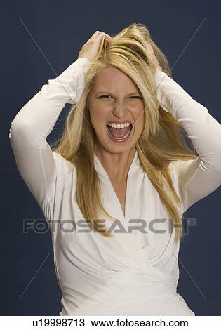 Stock Image - Screeming girl. Fotosearch