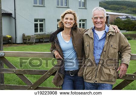 Seniors together on farm View Large Photo Image Stock Photo - Seniors together on farm. Fotosearch