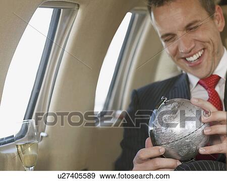 Stock Photo - Smiling businessman. Fotosearch