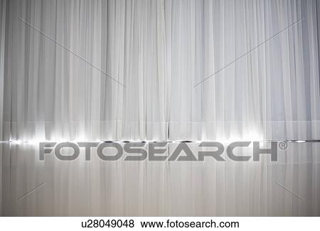 Strip of light shining through curtains View Large Photo Image Stock Photo - Strip of light shining through curtains. Fotosearch
