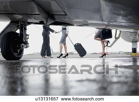 Stock Photo - Successful and powerful businesswomen. Fotosearch