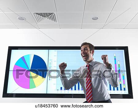 Successful businessman with graph View Large Photo Image Stock Image - Successful businessman with graph. Fotosearch