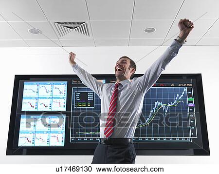 Successful businessman with graphs View Large Photo Image Stock Image - Successful businessman with graphs. Fotosearch