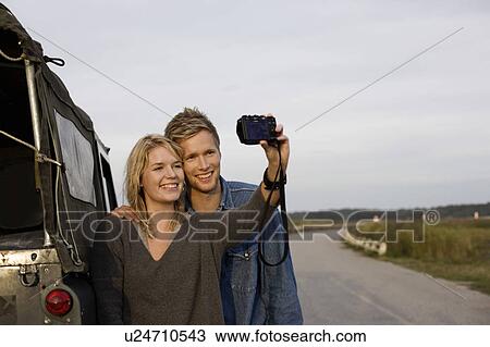 Taking pictures on the road View Large Photo Image Stock Image - Taking pictures on the road. Fotosearch