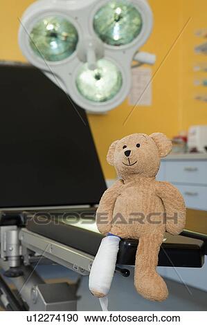 Teddy bear with dressing at couch View Large Photo Image Stock Image - Teddy bear with dressing at couch. Fotosearch