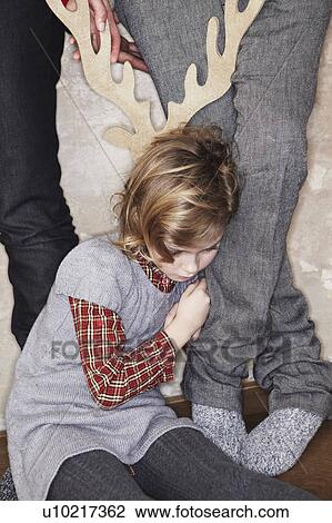 Tired girl with antlers View Large Photo Image Stock Image - Tired girl with antlers. Fotosearch