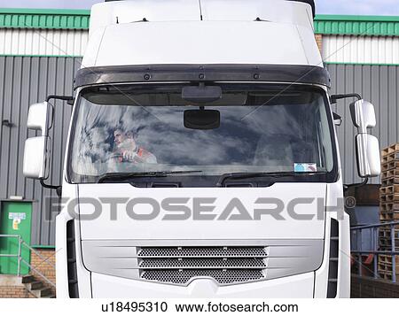 Truck driver in truck View Large Photo Image Stock Image - Truck driver in truck. Fotosearch