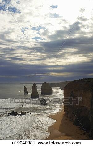 Twelve apostles cloudy sunset View Large Photo Image Stock Image - Twelve apostles cloudy sunset. Fotosearch