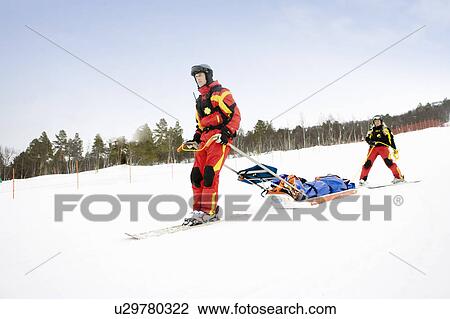 Two Rescuers in Piste View Large Photo Image Stock Image - Two Rescuers in Piste. Fotosearch