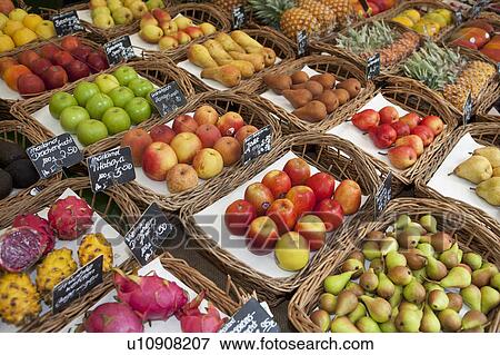 Various fruits presented on a market View Large Photo Image Stock Photo - Various fruits presented on a market. Fotosearch