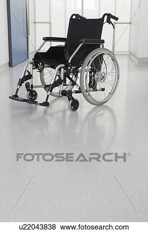 Stock Photo - Wheelchair in medical hall. Fotosearch