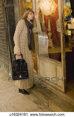 Stock Image - Window shopping. Fotosearch