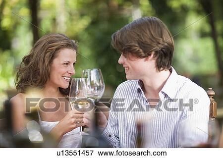 Woman and boy clinking glasses View Large Photo Image Stock Photo - Woman and boy clinking glasses. Fotosearch