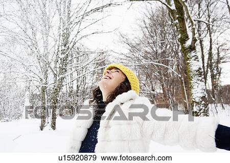 Woman dancing in snowy woods View Large Photo Image Stock Photo - Woman dancing in snowy woods. Fotosearch