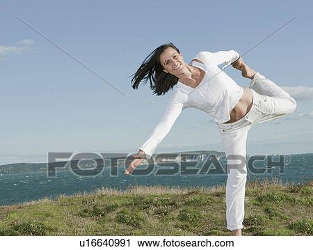 Woman exercising View Large Photo Image Stock Image - Woman exercising. Fotosearch