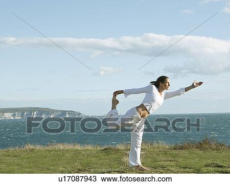 Woman exercising View Large Photo Image Stock Image - Woman exercising. Fotosearch