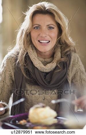Woman having dessert View Large Photo Image Stock Image - Woman having dessert. Fotosearch