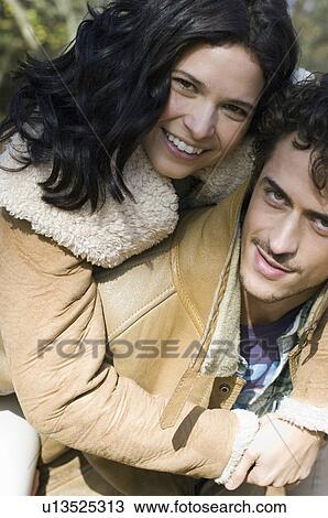 Woman hugging man View Large Photo Image Stock Image - Woman hugging man. Fotosearch