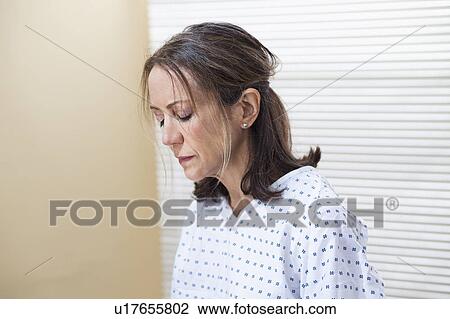 Woman in examination room View Large Photo Image Stock Image - Woman in examination room. Fotosearch