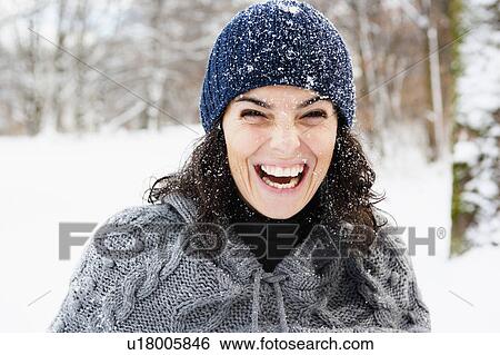 Woman in snow laughing View Large Photo Image Stock Photograph - Woman in snow laughing. Fotosearch