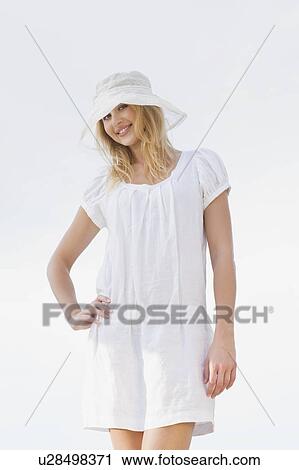 Woman in white View Large Photo Image Stock Image - Woman in white. Fotosearch