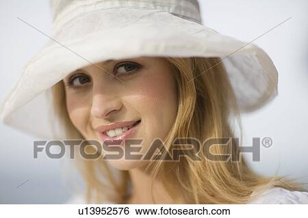 Stock Photograph - Woman in white. Fotosearch
