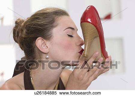 Woman kissing her pumps View Large Photo Image Stock Photography - Woman kissing her pumps. Fotosearch