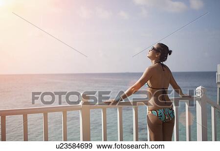 Stock Photo - Woman on vacation. Fotosearch