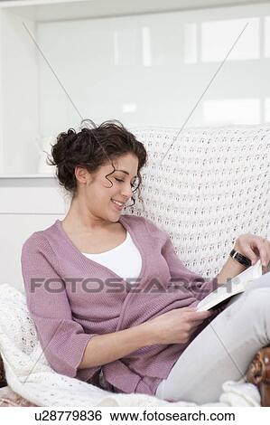 Stock Photograph - Woman reading. Fotosearch