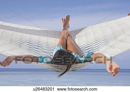 Stock Image - Woman relaxing. Fotosearch