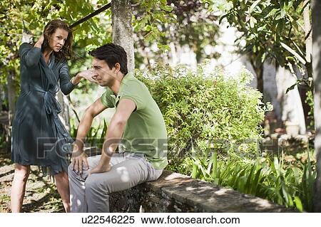 Woman reproaching a man View Large Photo Image Stock Photography - Woman reproaching a man. Fotosearch