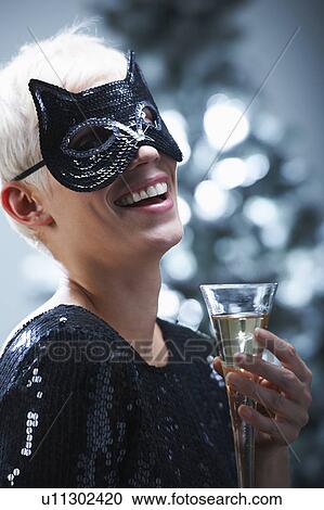 Woman wearing a cat mask View Large Photo Image Stock Image - Woman wearing a cat mask. Fotosearch
