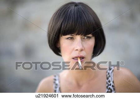Stock Image - Woman with cigarette. Fotosearch