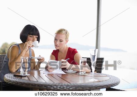 Stock Photography - Women talking. Fotosearch