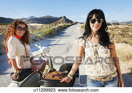 Women with motorbike and sidecar View Large Photo Image Stock Image - Women with motorbike and sidecar. Fotosearch