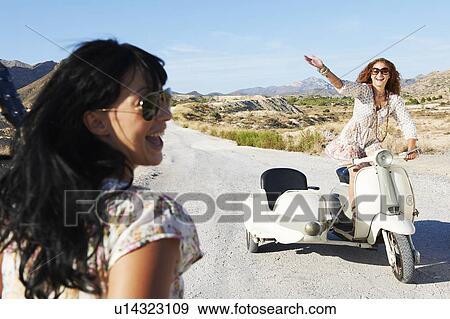 Women with motorbike and sidecar View Large Photo Image Stock Photo - Women with motorbike and sidecar. Fotosearch