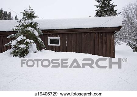 Wooden shed covered in snow View Large Photo Image Stock Photo - Wooden shed covered in snow. Fotosearch