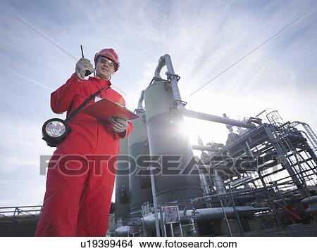 Picture - Worker at underground gas storage plant. Fotosearch