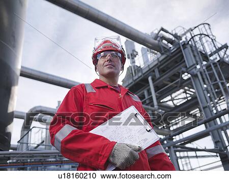 Worker at underground gas storage plant View Large Photo Image Stock Image - Worker at underground gas storage plant. Fotosearch