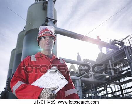 Stock Photo - Worker at underground gas storage plant. Fotosearch