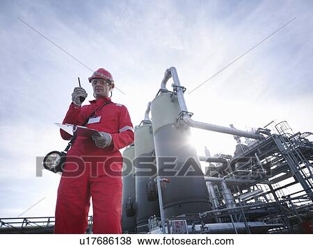 Worker at underground gas storage plant View Large Photo Image Stock Photo - Worker at underground gas storage plant. Fotosearch