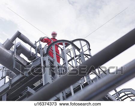 Worker on underground gas storage plant View Large Photo Image Stock Image - Worker on underground gas storage plant. Fotosearch