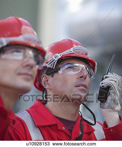 Workers at underground gas storage plant View Large Photo Image Stock Image - Workers at underground gas storage plant. Fotosearch