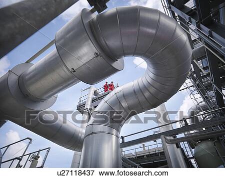 Workers at underground gas storage plant View Large Photo Image Stock Photo - Workers at underground gas storage plant. Fotosearch