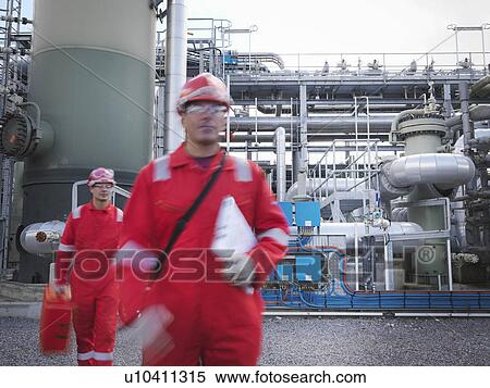Stock Photography - Workers at underground gas storage plant. Fotosearch