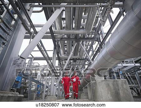 Workers in underground gas storage plant View Large Photo Image Stock Photo - Workers in underground gas storage plant. Fotosearch