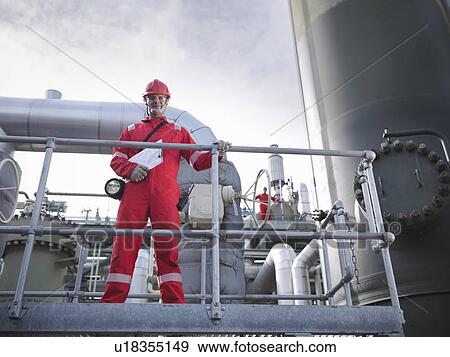 Workers on underground gas storage plant View Large Photo Image Stock Photo - Workers on underground gas storage plant. Fotosearch