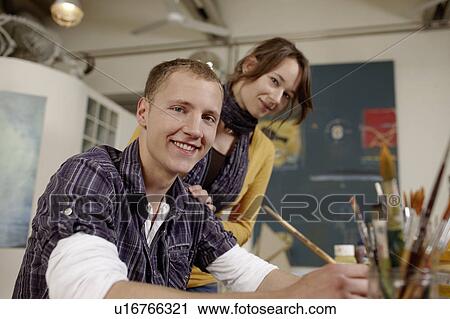 Young artist with girlfriend View Large Photo Image Stock Image - Young artist with girlfriend. Fotosearch